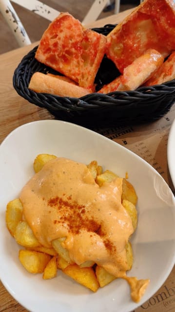 Barcelona: Tapas and Pintxos Tour with Crema Catalana - The food stops and what to expect