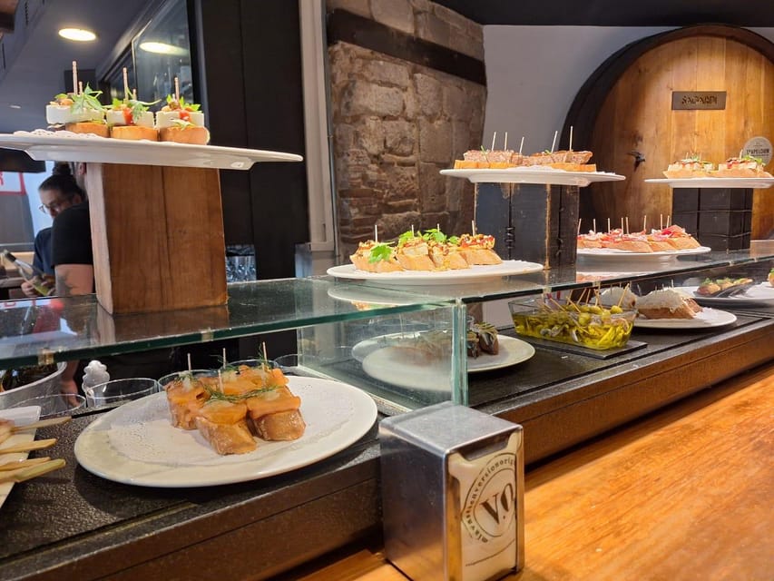 Barcelona: Tapas and Pintxos Tour with Crema Catalana - Vermut and cava with your food