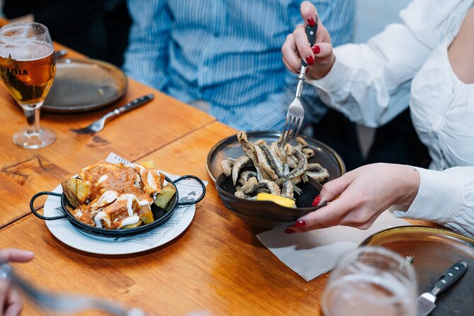 Barcelona Tapas Food Walking Tour with Wine in El Born - Croquettes and wine on Carrer Ample