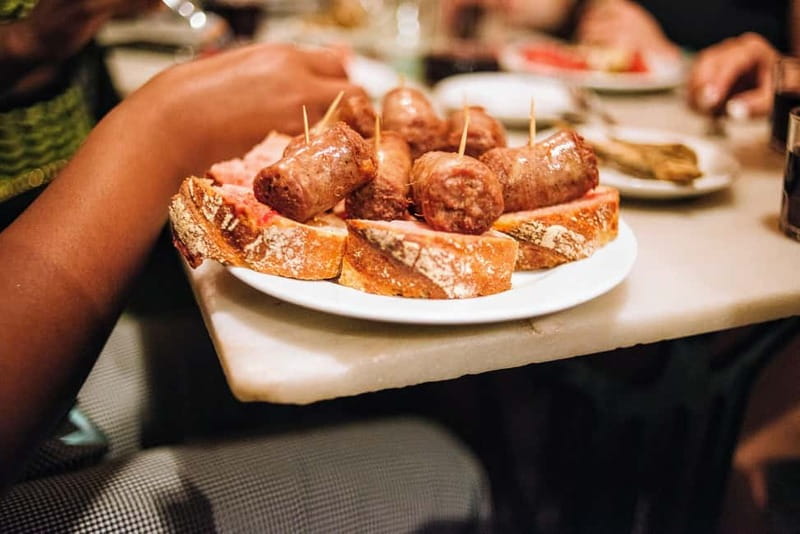 Barcelona: Tapas, Wine & History Tour of the Old Town - First tastes at a family-owned Barcelona bar