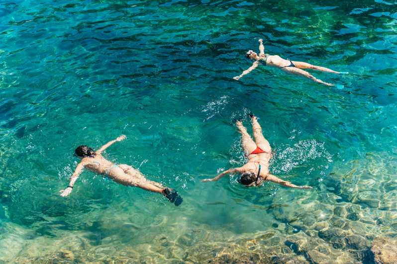 Barcelona: Tossa de Mar Kayak & Snorkel Tour w/3-Course Meal - Getting ready for the water