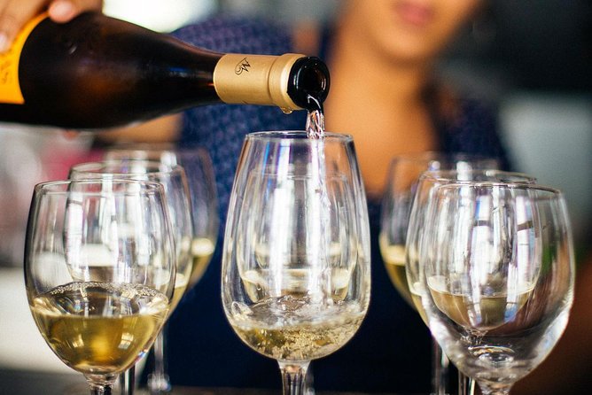 Barcelona With Locals: Wine and Tapas Private Tour - Three stops, three drinks, and the limits of the food
