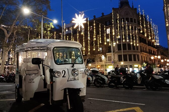Christmas Lights Tour of Barcelona in Private Eco Tuk Tuk - The Arc de Triomf finish
