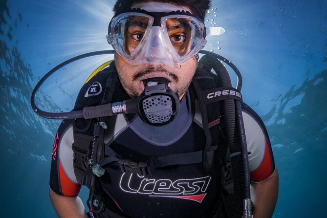 Discover PADI Diving in Barcelona - Entering the protected water near Bogatell Beach