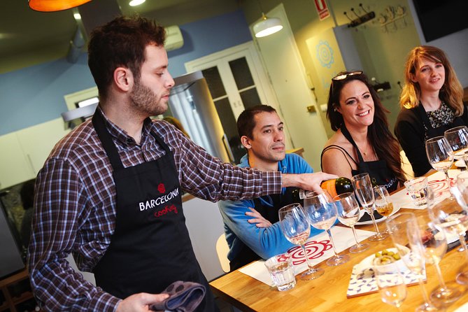 Interactive Paella & Market: Bottomless Wine & Rambla Views - The kitchen turns you into part of the meal