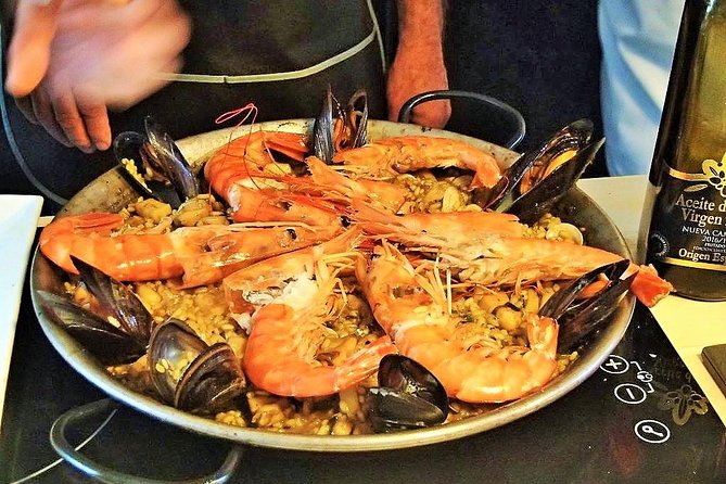 La Boqueria Market and Paella Cooking Class in Barcelona - From Plaça Reial to the heart of La Boqueria