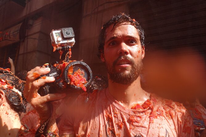 La Tomatina Day Trip from Barcelona with Ticket & Party Access - Breakfast, welcome drink, and party access