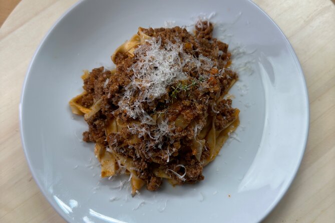 Make fresh pasta and Italian aperitivo In Barcelona - The meal: bruschetta, sauce, pasta, and tiramisu
