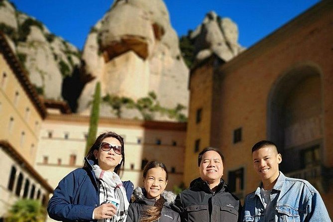 Montserrat Day Trip Private or Small Group with Basilica Tickets - Entering the basilica to see La Moreneta