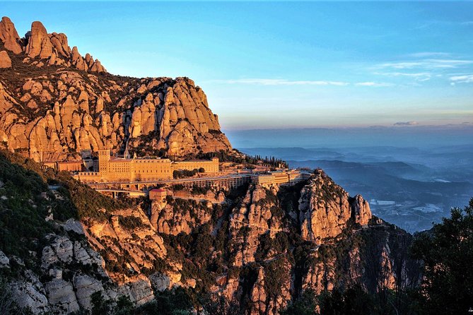 Montserrat Monastery with Easy Hike & Sitges Tour from Barcelona - Montserrat Monastery: a sacred site in a wild setting