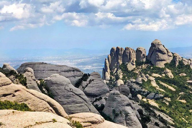 Montserrat Private Tour from Barcelona with Pick-up - Walking through the Abadia de Montserrat