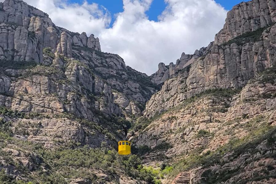 Montserrat Small Group Tour with Train and Cable Car - The cable car gives you the dramatic arrival