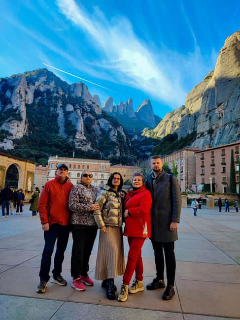 Montserrat Small Group Tour with Train and Cable Car - Walking through the monastery area