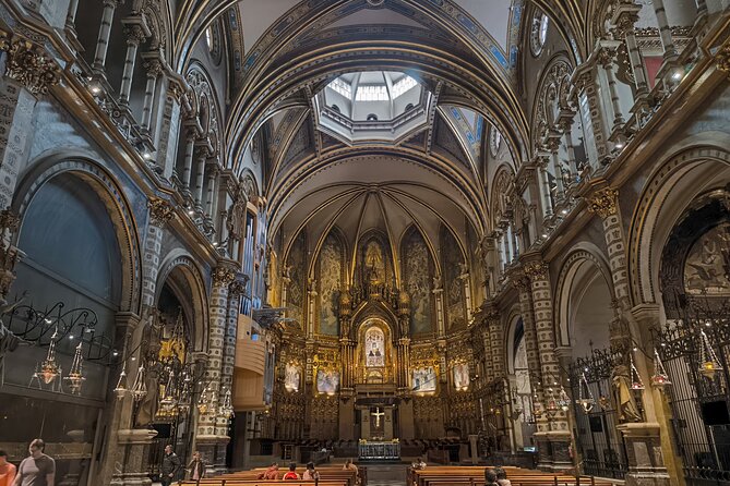 Montserrat Tour by Train with Cable Car and Cogwheel - Plaça d’Espanya to Monistrol by public train