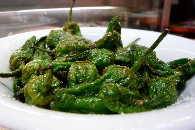 Night Tapas Walking Tour in Barcelona Modernist Area with Small Group and Dinner - What your guide adds to the night