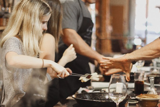 Paella Cooking Class with Professional Chef: Four Course Dinner - Starting with cava in El Raval