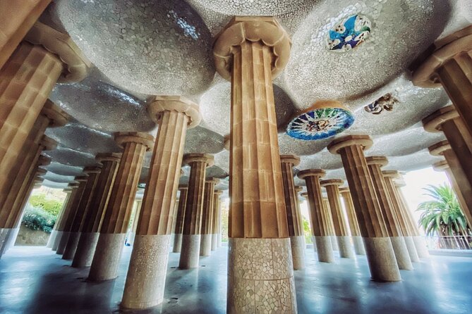 Park Guell Guided Tour in Barcelona with Entry - Gardens, sculptures, and the stories between the famous sights