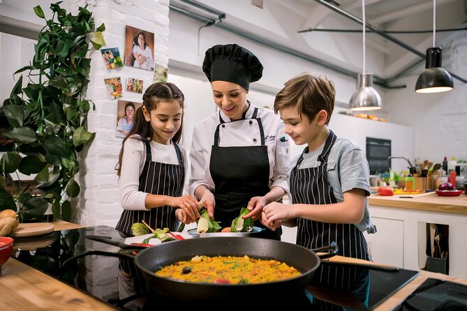 Private Paella Cooking Class and Market Visit with Personal Chef - Making seafood paella step by step