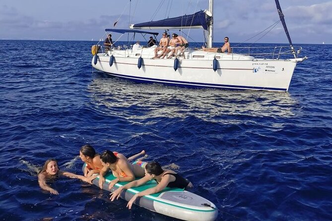 Private sailing and paddlesurfing tour with skipper up to 11 people - Port Olímpic: a modern start with Olympic connections