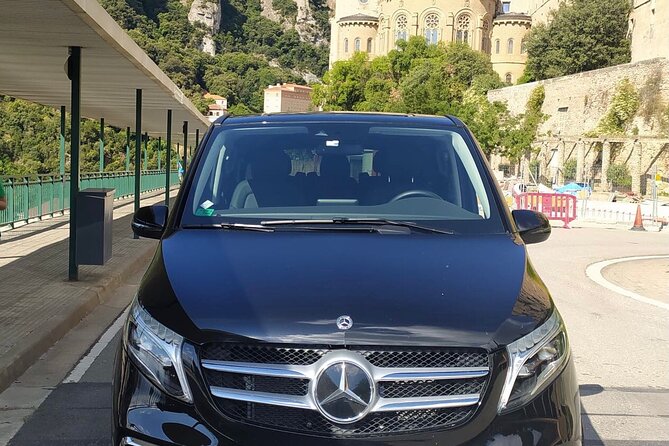 Private Transfer from Barcelona to Montserrat Round Trip - A waiting chauffeur changes the return journey