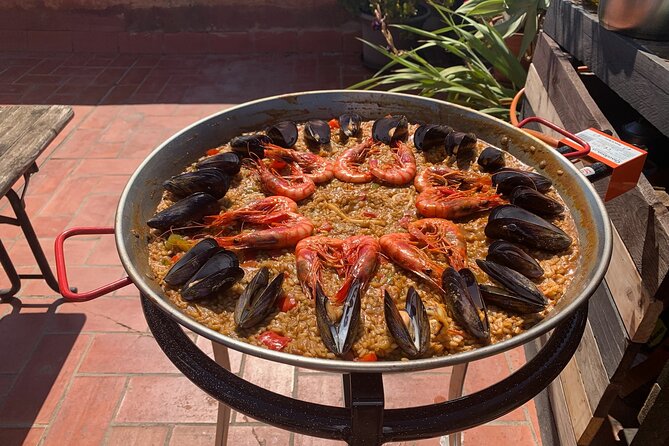 Rooftop Paella Seafood Cooking Class Experience in Barcelona - The rooftop terrace and old-port views