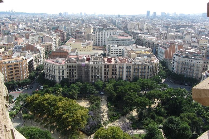 Sagrada Familia Fast Track Guided Tour with Towers Access - Riding up one tower for Barcelona views