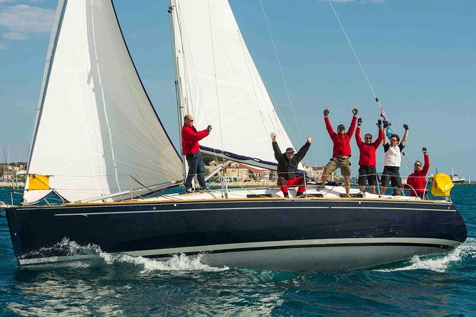 Small-Group Sailing Lesson in Barcelona - Clothing, comfort, and weather planning
