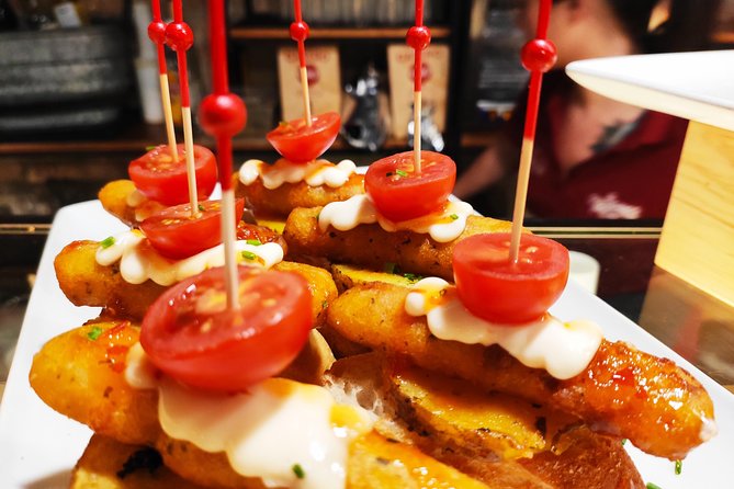 Spanish Wine and Tapas Tour in a Local Neighborhood in Barcelona - Four stops, four different moods