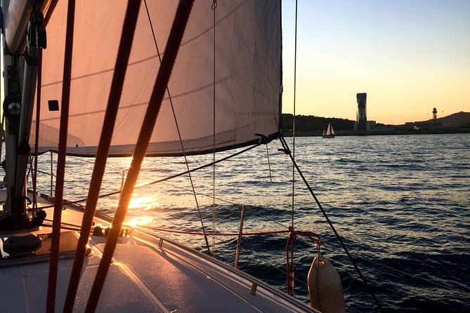Sunrise Private Sailing Experience from Port Olimpic - Taking a swim from the yacht
