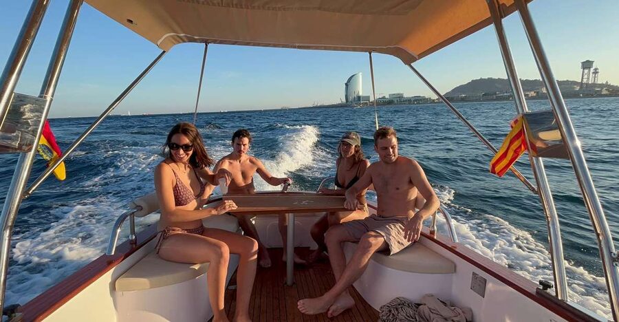 Sunset from a private Classic Yacht - Leaving Port Olimpic for a quieter view of Barcelona
