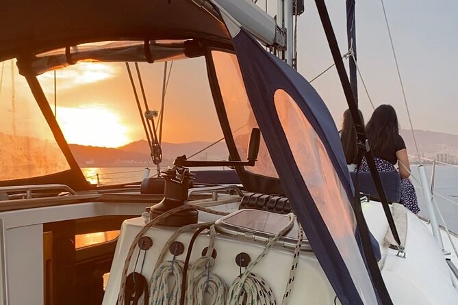Sunset Sailboat Tour along the Coast with Open Bar - Cava, snacks, music, and the social mood