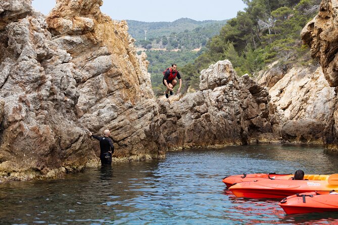 Tossa de Mar: Kayak & Snorkel Tour with Paella from Barcelona - What the small-group format changes